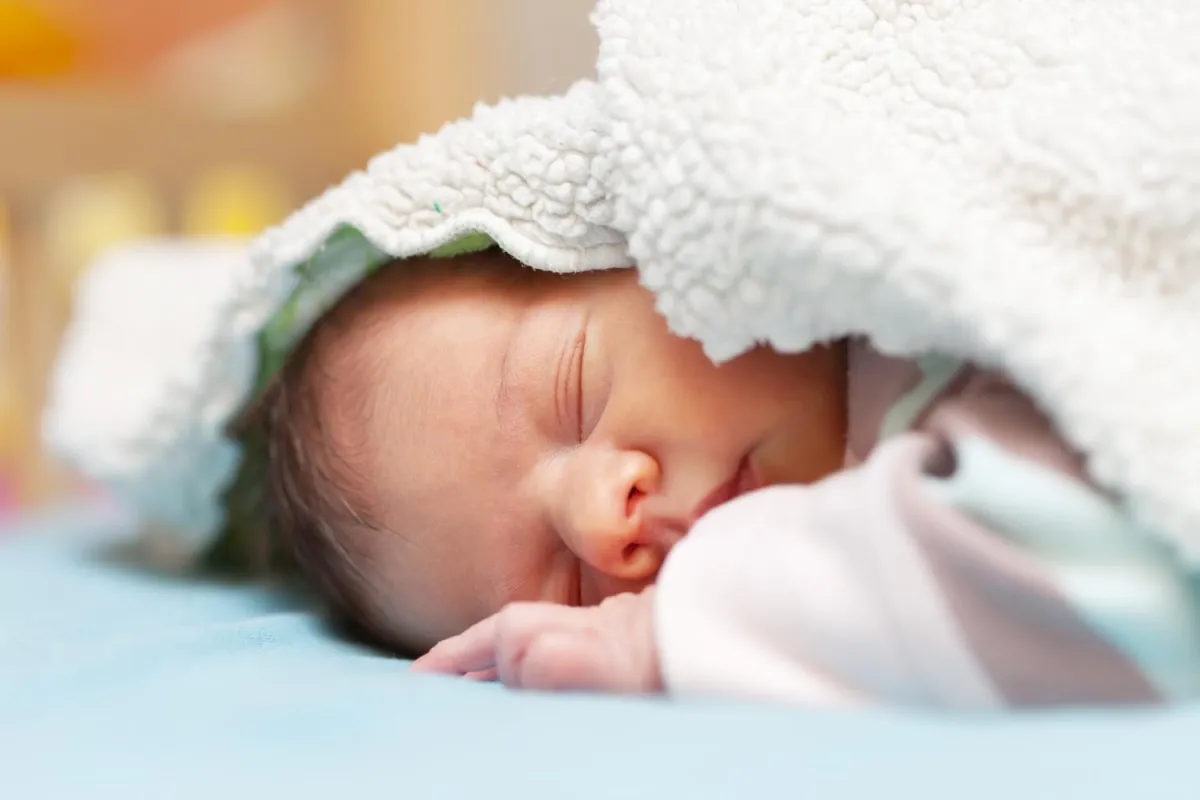 Newborn photography — big brother with baby sibling
